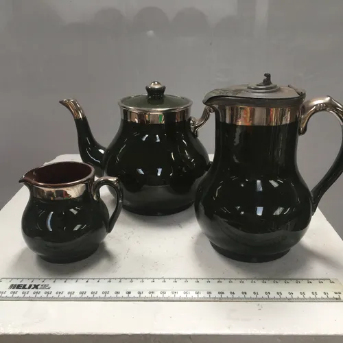 Glazed Black Tea and Coffee Set with Silver Trim Detailing 