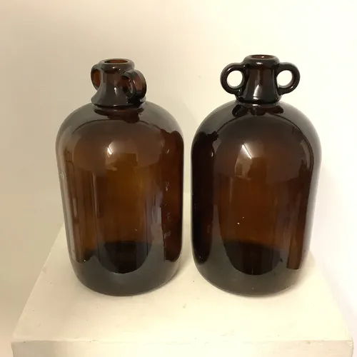 Large brown glass flagons demijohn