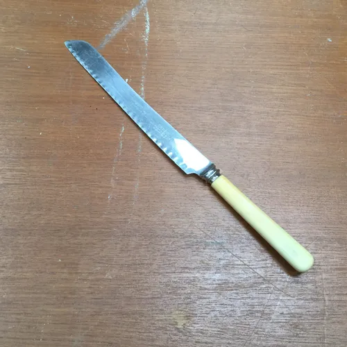 Ivory Handle Bread Knife