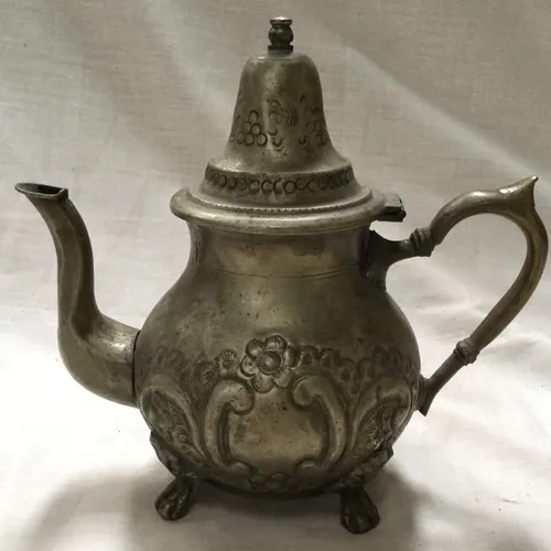 Pewter Teapot with Curved Handle and Floral Engravings