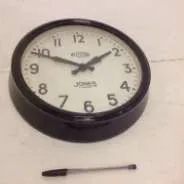 Jones 'No electric' black metal analogue wall clock with cream face and glass face cover