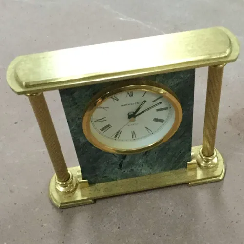 Gold and marble clock
