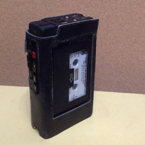 Period black handheld dictaphone / tape player in vinyl casing