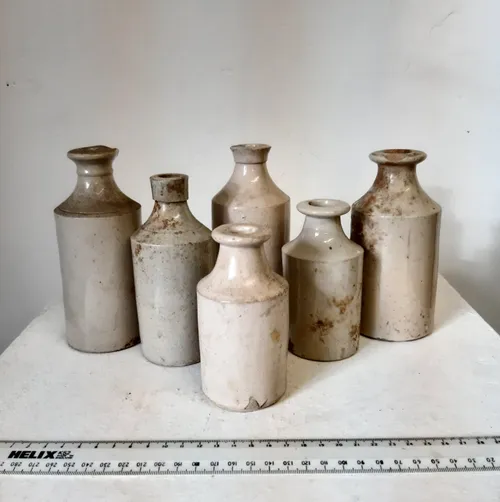 Various Cream Stoneware Bottles