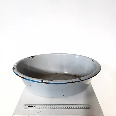 Pale Blue enamelware wash basin with blue trim