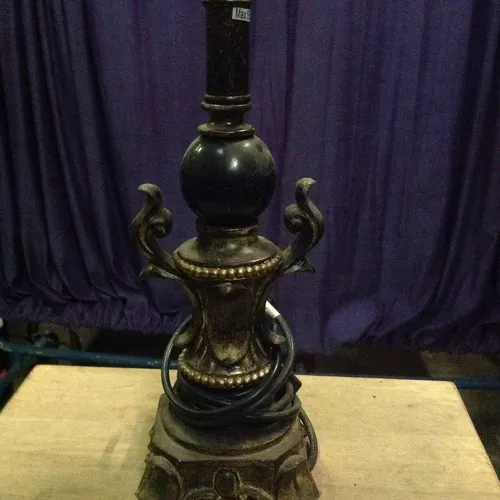 black metal ornate stick lamp base