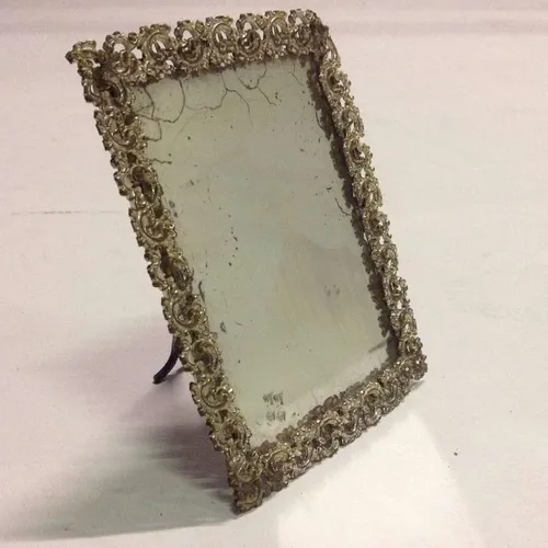 table top distressed mirror with silver trim