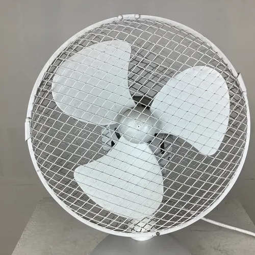 White desk fan with metal cage