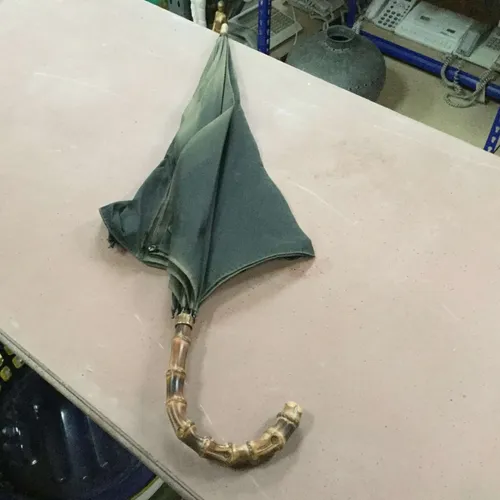 Green umbrella with ridged handle