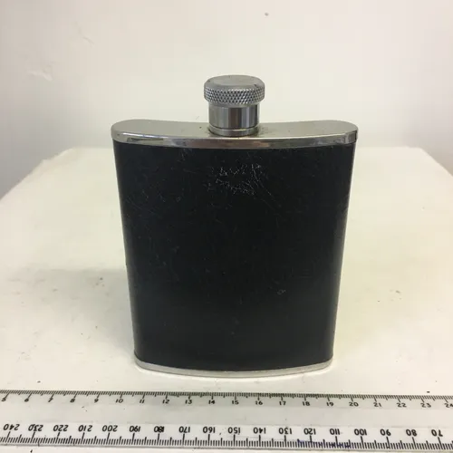 Silver hip flask with black leather cover 