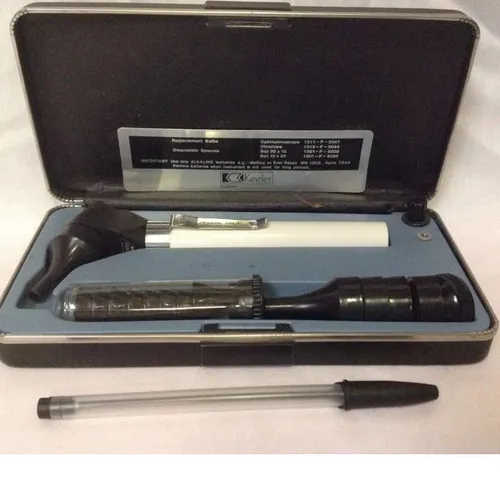 Keeler otoscope with replacement ear pieces in case