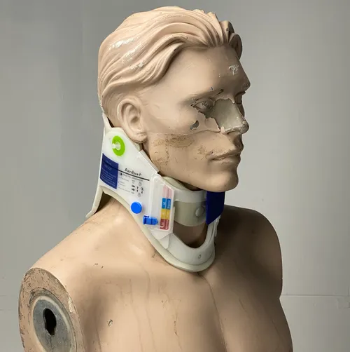 White and Blue Neck Brace