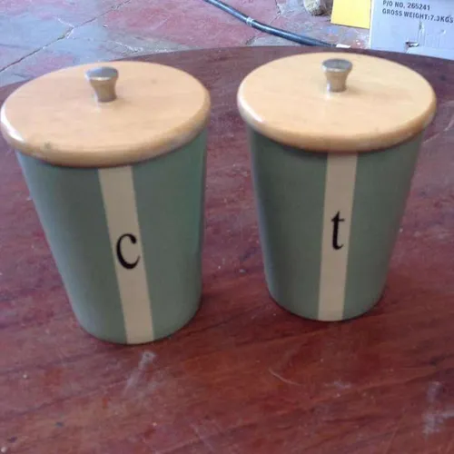 Painted ceramic coffee and tea jars with wooden lids