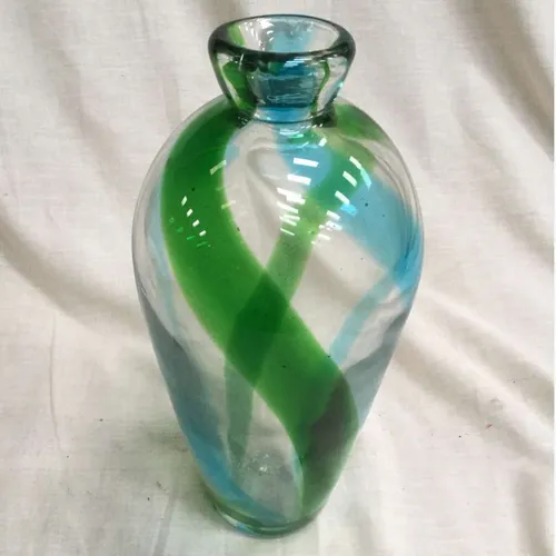 Clear blown glass vase with blue and green swirl