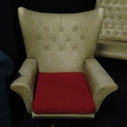 Cream leather wing back chair