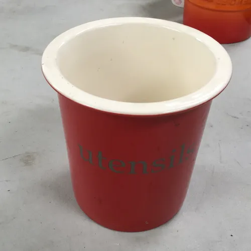 Red and white ceramic utensils pot 