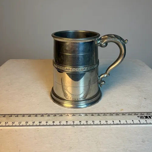 Silver pewter beer mug with Celtic band detail