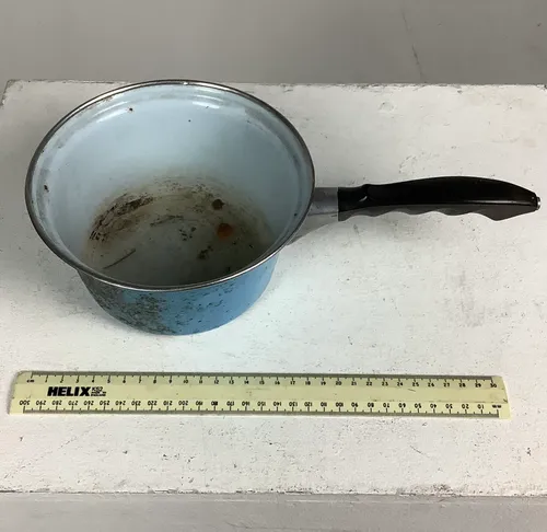 Worn Blue Pot with Black Handle