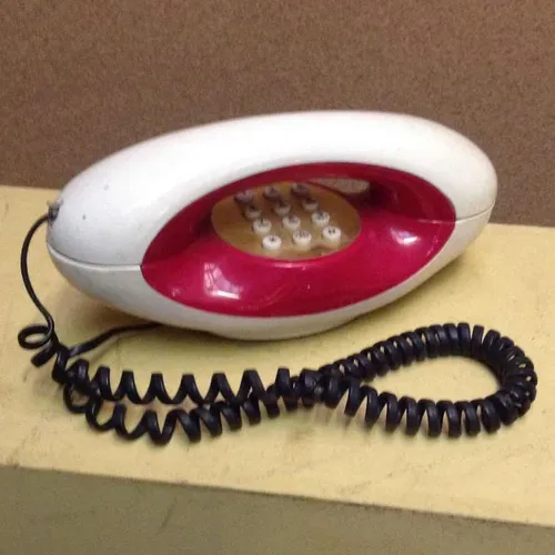 1980s white and red BT Genie corded push button telephone