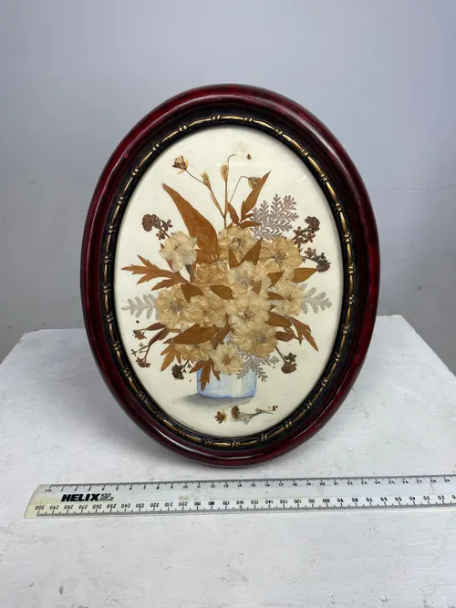 Mahogany Oval Frame with Pressed Flowers and Leaves
