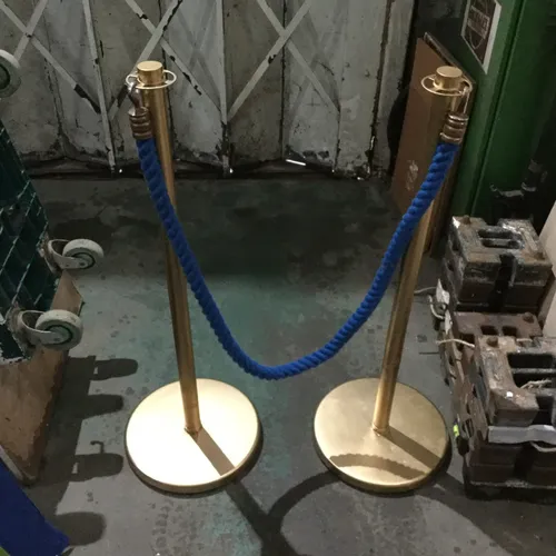 Gold Pole with Blue Rope Barrier