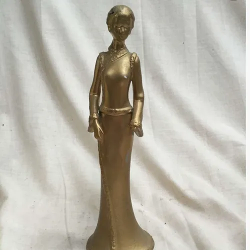Gold Ceramic figurine of a Lady