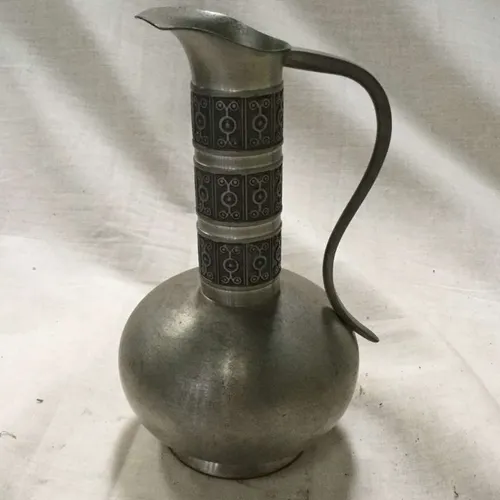 Thin neck pewter jug 