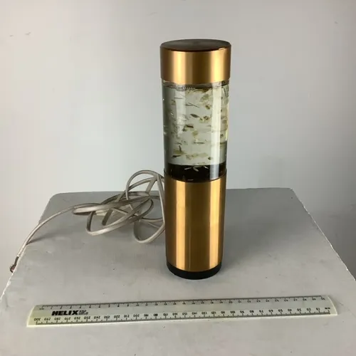 Gold Lamp with Floating Gold Pieces in Water