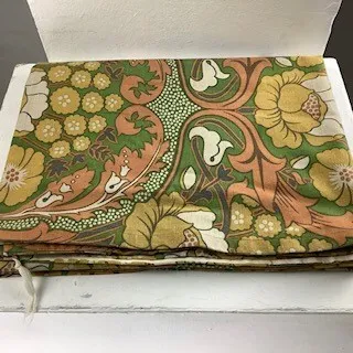 Green Orange and Yellow Floral Patterned Fabric