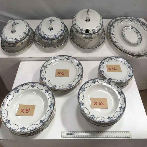 Blue and white crockery/dinner set with gold trim