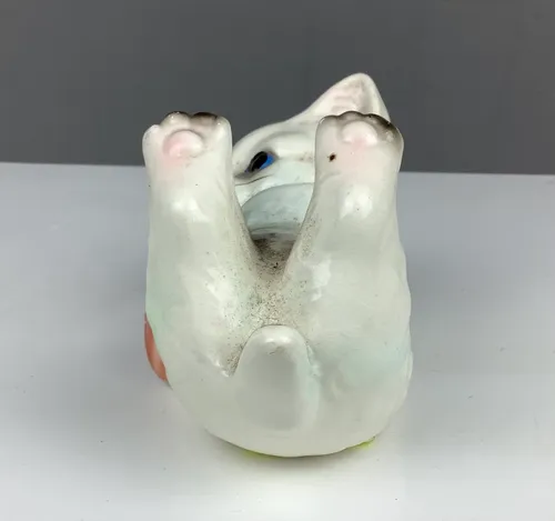 White Ceramic Cat with Red Brown Yarn