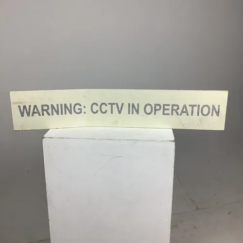 White and Grey Warning: CCTV in Operation Sign