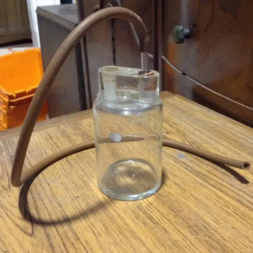 glass laboratory jar with tube