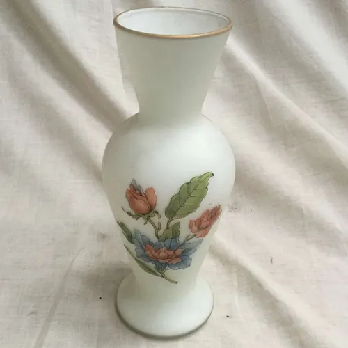 White painted glass vase with gold trim and floral decoration