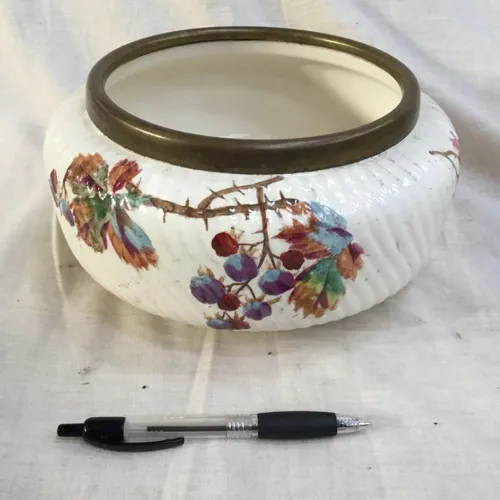 White plant pot with berry, leaves and thorn painted design