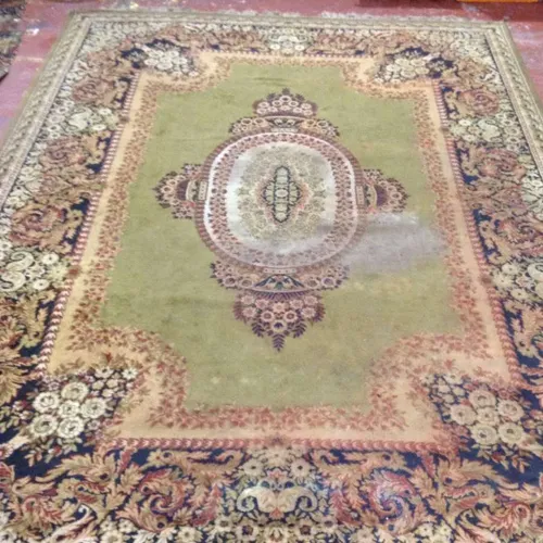 Patterned Green Persian-style Rug with Blue/Cream Decoration