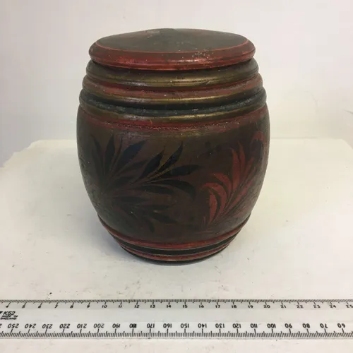 Small wood barrel style pot with flower design