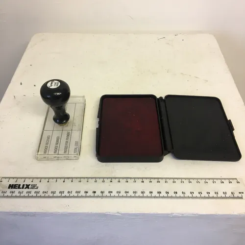 Invoice stamp with red ink pad