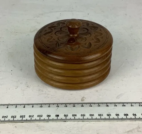 Round wooden engraved box with lid