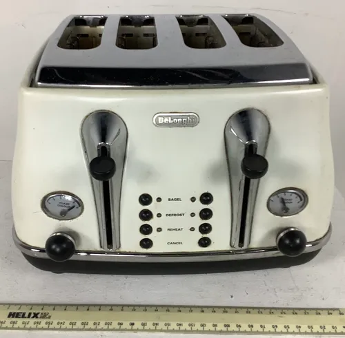 White and Silver Delonghi Toaster