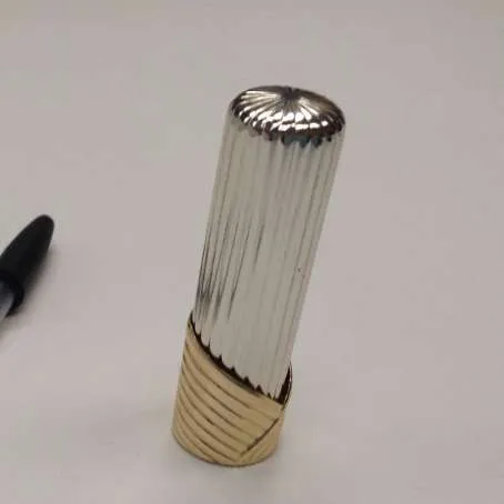 silver and gold lipstick case