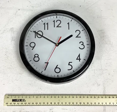 Black Clock with White Face