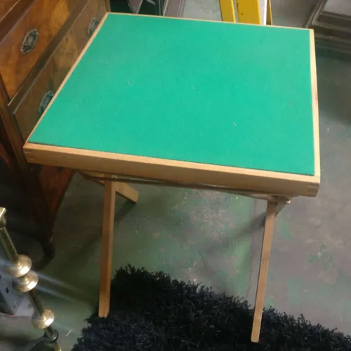 Green folding card table