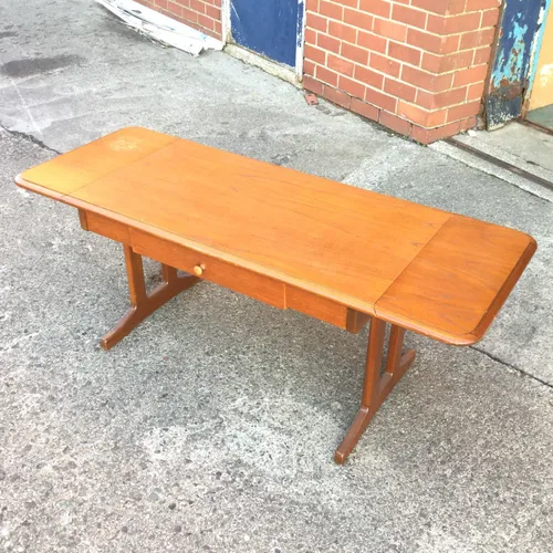 Wood Coffee Table with Dropleaf Ends and Drawer
