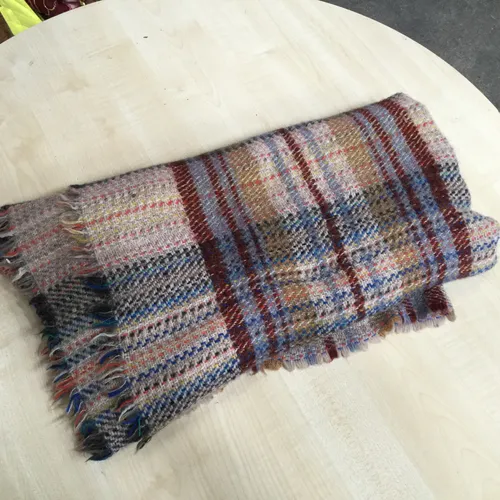 Pale tartan blanket 