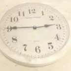 Stuart Superior white plastic analogue wall clock with white face and plastic face cover