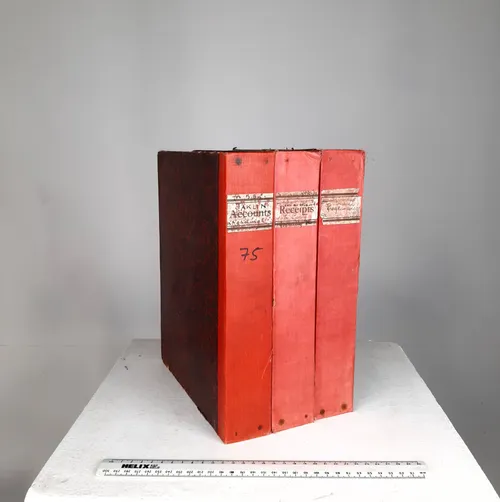 Period well-worn red box file with red spine and marble detail