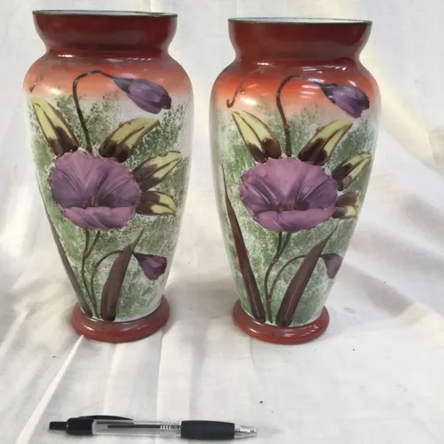 Pair of ceramic vases with painted purple flowers