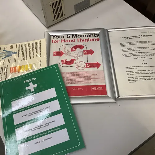 Various framed/laminated information posters