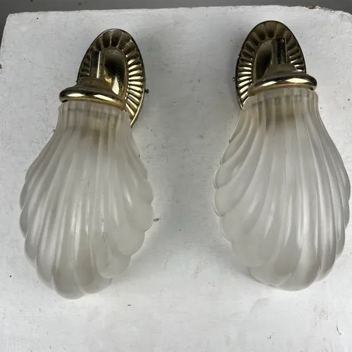 Pair of brass wall sconces lights with opaque scalloped glass shade